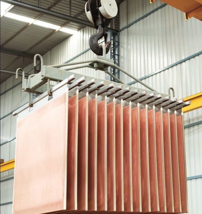 Copper cathode sheets lifted by a crane at the plant